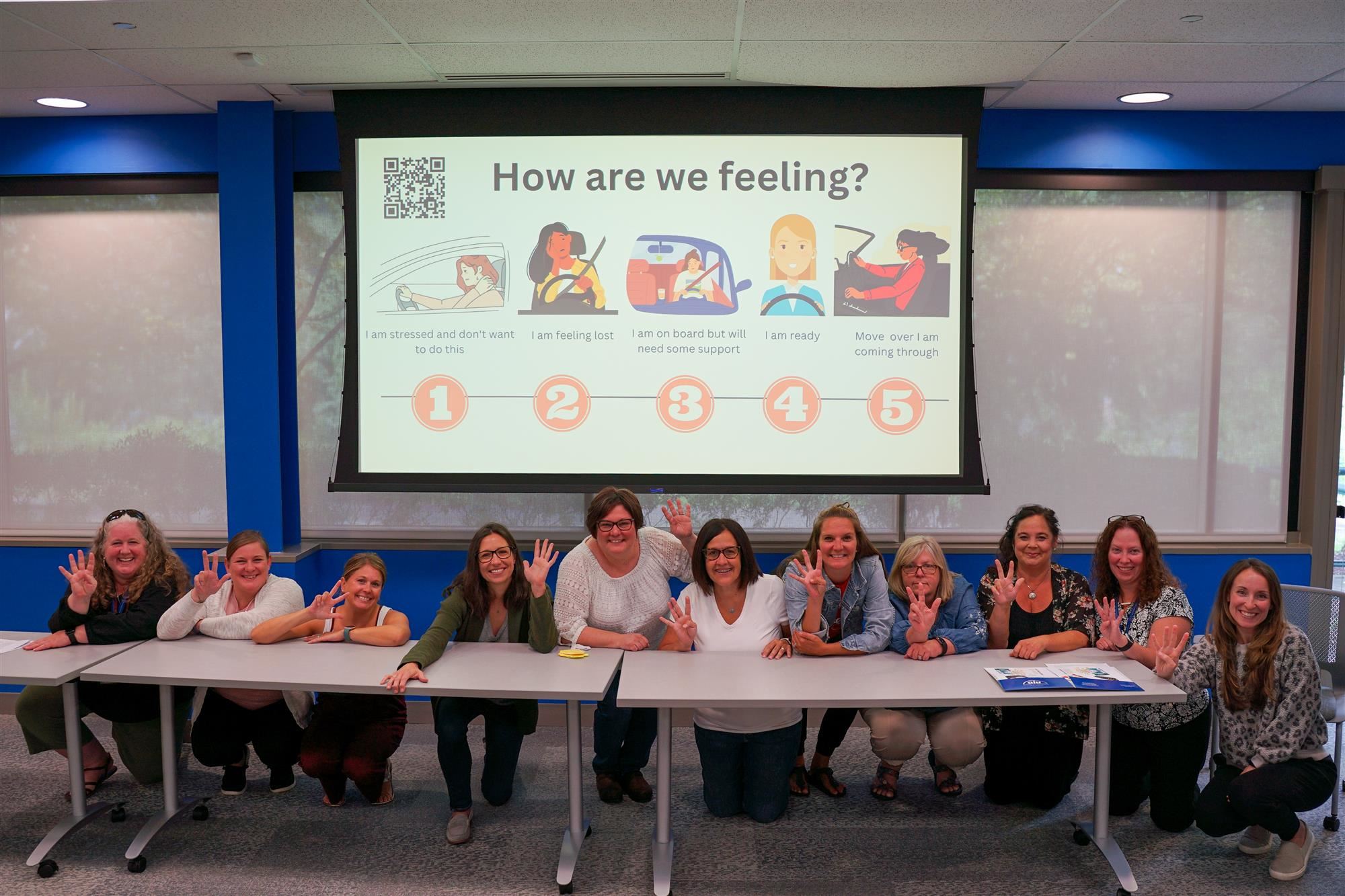 Educators from the AIU Deaf and Hard of Hearing Support Program during an inservice pose at the AIU Central Office.